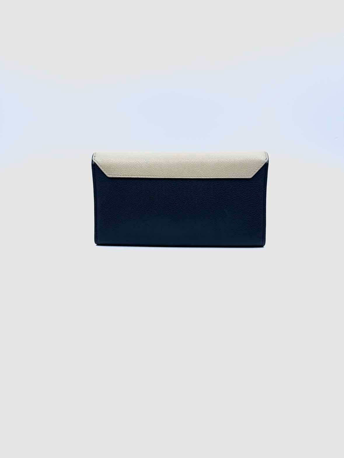 LOUIS VUITTON Portefeiulle Lock-Me II Navy, Cream Leather Solid Wallet