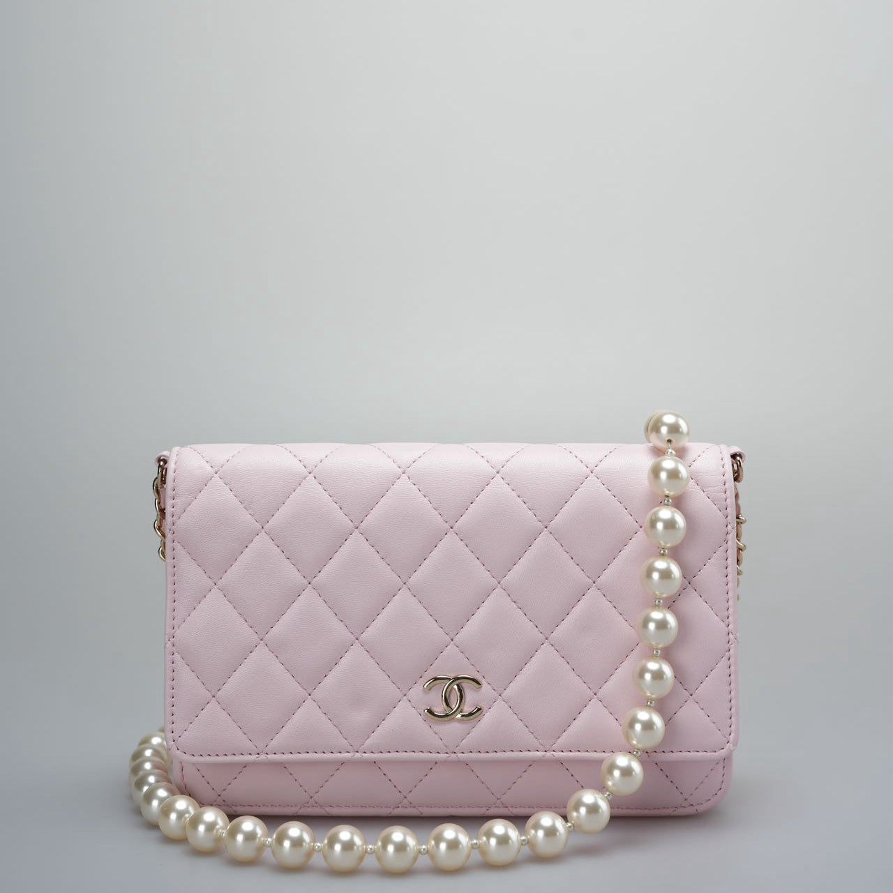 Chanel Baby Pink Wallet on Chain (WOC) in Quilted Lambskin with Pearl Chain – Gold Hardware