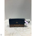 Wristlet Designer By Coach, Size: Medium