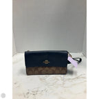 Wristlet Designer By Coach, Size: Medium