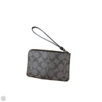 Wristlet Designer By Coach, Size: Medium