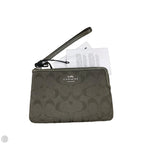Wristlet Designer By Coach, Size: Small