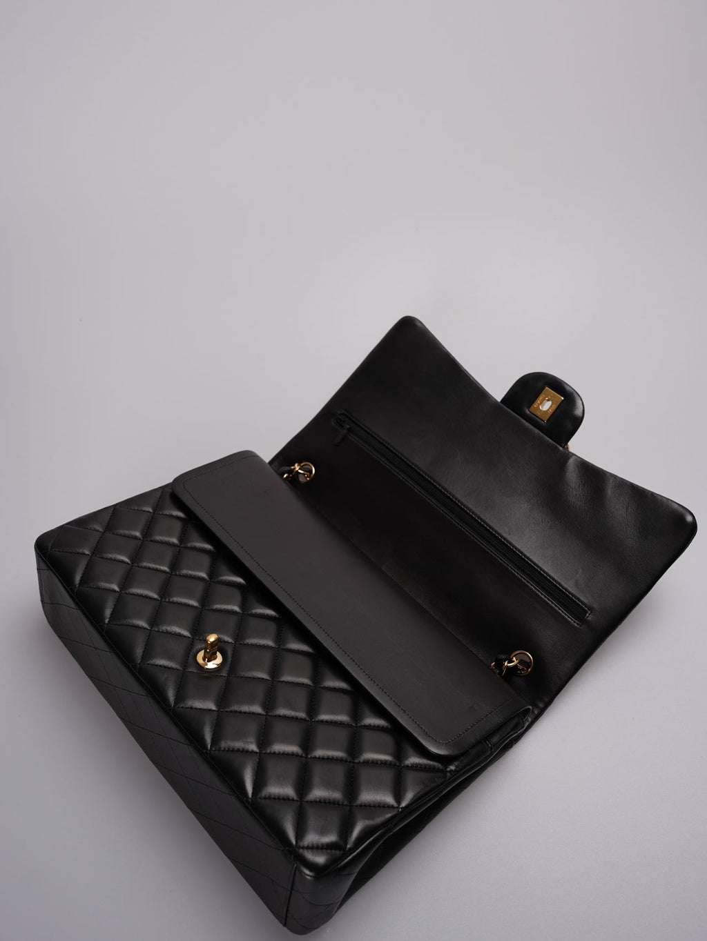 Chanel Timeless Flap Quilted Maxi Lambskin Gold-tone Black