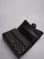 Chanel Timeless Flap Quilted Maxi Lambskin Gold-tone Black