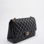 Chanel Timeless Classic Flap Bag Black Jumbo Quilted Leather Gold Hardware