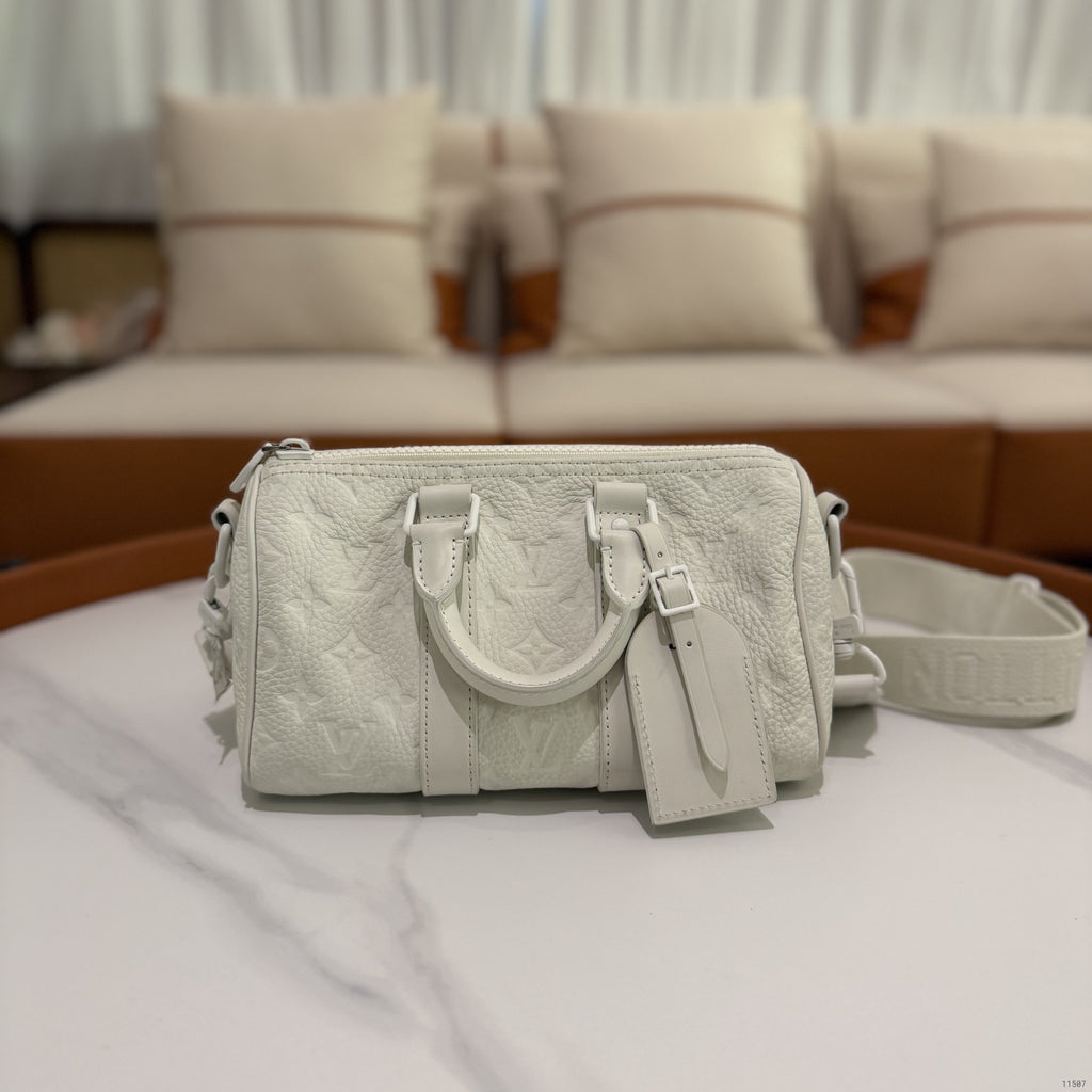 Louis Vuitton Keepall 25 White Embossed Monogram Top Handle Shoulder Bag