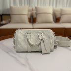 Louis Vuitton Keepall 25 White Embossed Monogram Top Handle Shoulder Bag