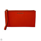 Jet Set Travel Top Zip Wristlet Designer By Michael Kors, Size: Large