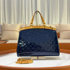 LOUIS VUITTON PATENT LEATHER HANDBAG
