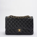 Chanel Timeless Classic Flap Bag Black Jumbo Quilted Leather Gold Hardware
