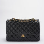 Chanel Timeless Classic Flap Bag Black Jumbo Quilted Leather Gold Hardware
