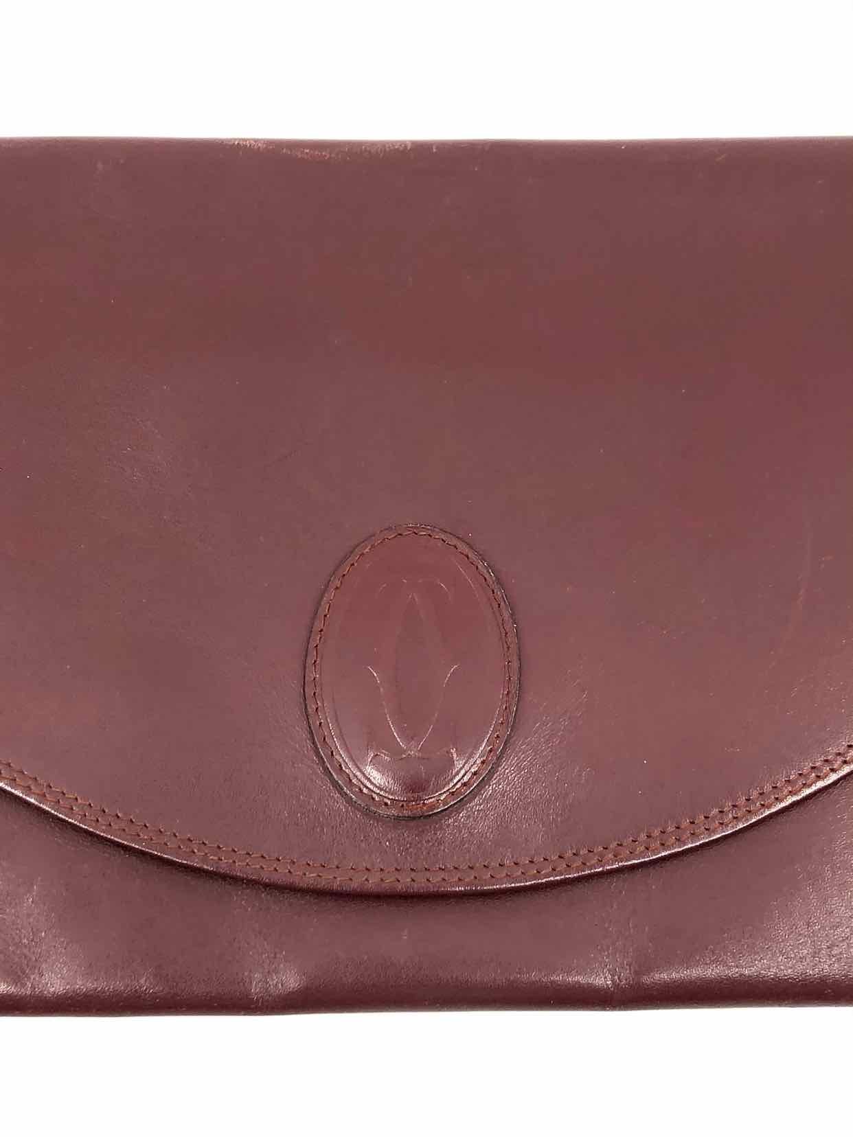 CARTIER Maroon Solid Clutch