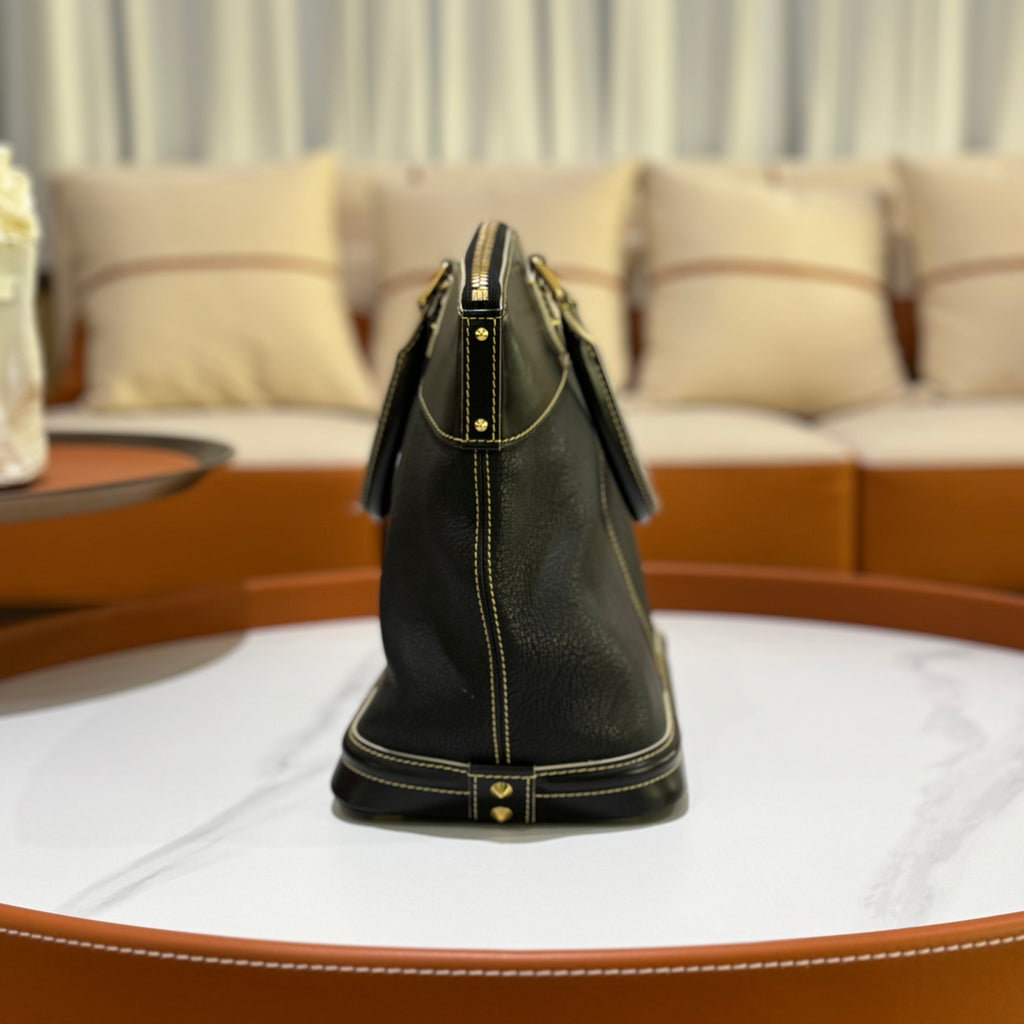 LOUIS VUITTON SUHALI LOCK IT MM