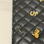 CHANEL Black Quilted Lambskin Limited Edition Badge Clutch