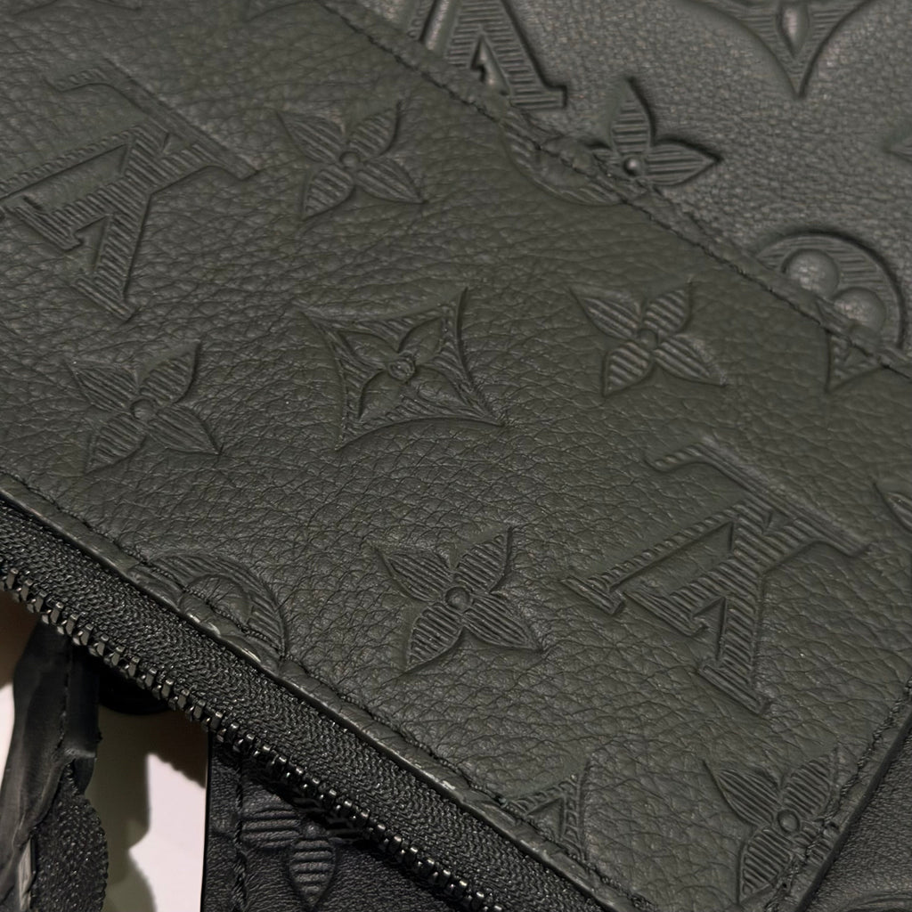 Louis Vuitton Gaston Wearable Wallet Embossed Leather Crossbody Bag