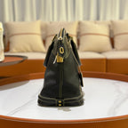 LOUIS VUITTON SUHALI LOCK IT MM