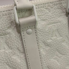 Louis Vuitton Keepall 25 White Embossed Monogram Top Handle Shoulder Bag