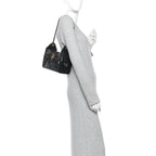 Shiny Crumpled Calfskin Quilted Mini Chanel 25 Handbag Black