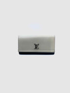 LOUIS VUITTON Portefeiulle Lock-Me II Navy, Cream Leather Solid Wallet