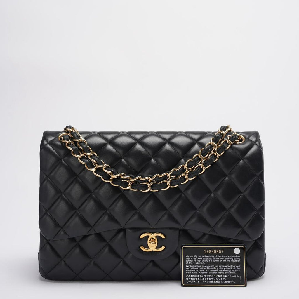 Chanel Timeless Classic Flap Bag Black Jumbo Quilted Leather Gold Hardware