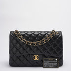 Chanel Timeless Classic Flap Bag Black Jumbo Quilted Leather Gold Hardware