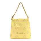 Shiny Calfskin Eyelet CC Small Chanel 22 Light Yellow