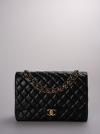 Chanel Timeless Flap Quilted Maxi Lambskin Gold-tone Black