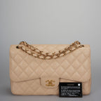 Chanel Classic Double Flap Bag Jumbo in Beige Quilted Caviar Leather with Gold Hardware