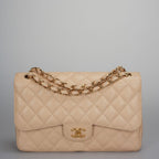 Chanel Classic Double Flap Bag Jumbo in Beige Quilted Caviar Leather with Gold Hardware