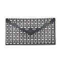 Alaia Clutch