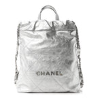 Metallic Calfskin Quilted Chanel 22 Backpack Silver